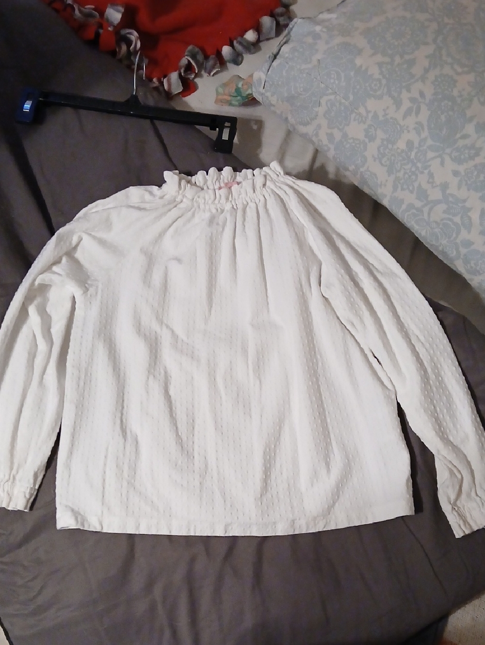 White Textured Long Sleeve Smocked Neck Blouse